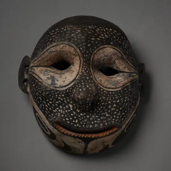 African wood/painted mask,